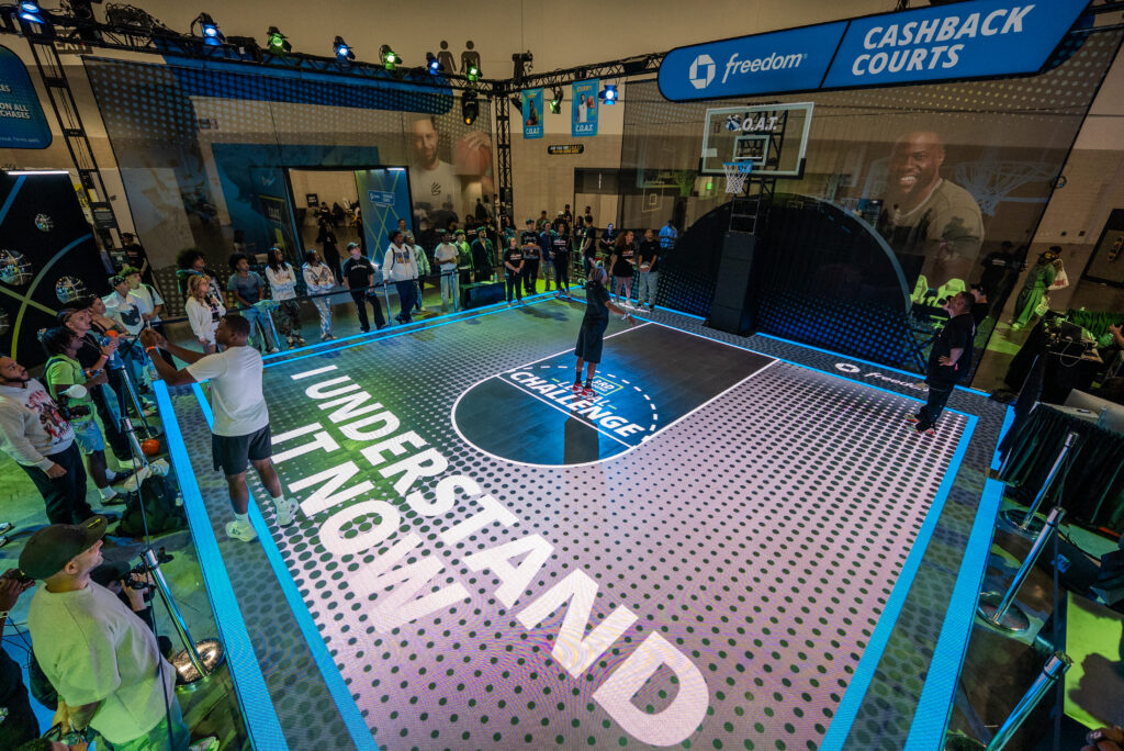 The Chase court displays large pink text beneath a basketball hoop.