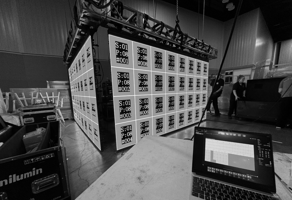 A black-and-white view of an eBay video display showing a test pattern during setup.
